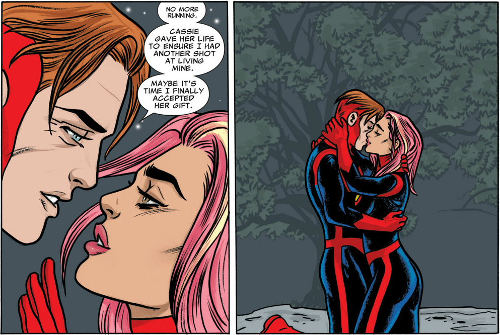 Scott and Darla, standing near a tree...