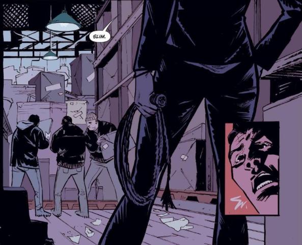 Catwoman confronts her goons